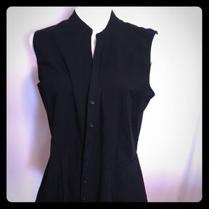 Sleeveless button down top